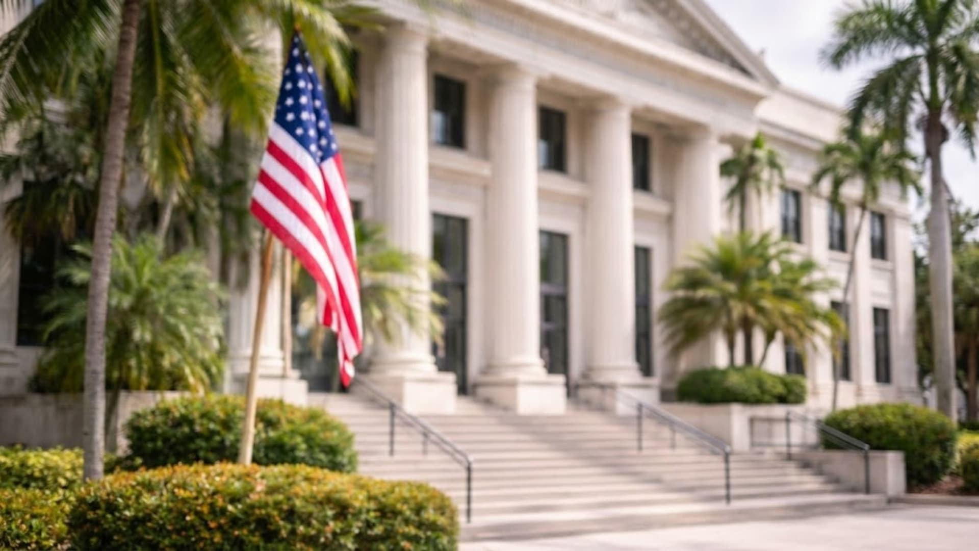 Florida Registered Agent government building with columns and U.S. flag in a calm, professional environment.